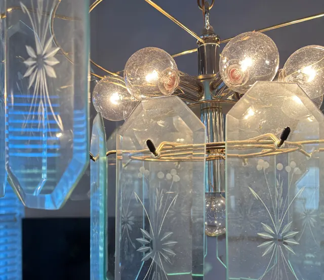 Before: A cut-glass chandelier with cloudy panels.
